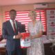 EFCC Benin zonal presents return money to a British lady.