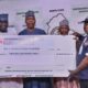 Zulum presenting N2bn cheque to Borno NLC chairman