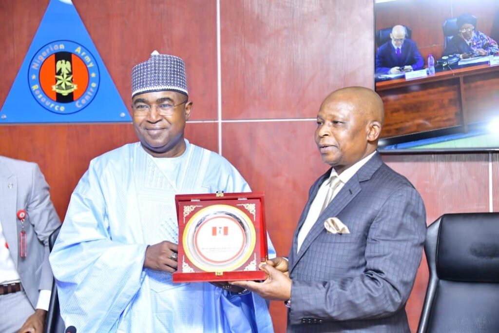 Chairman/Chief Executive Officer of the National Drug Law Enforcement Agency, NDLEA, Brig. Gen. Mohamed Buba Marwa (Retd) presenting a plaque to the Attorney General of the Federation and Minister of Justice, Lateef Fagbemi, SAN at the opening ceremony of a two-day Drug Prevention Treatment and Care, DPTC, training organised by NDLEA for wives of state governors in Abuja on Monday 12th February 2024.