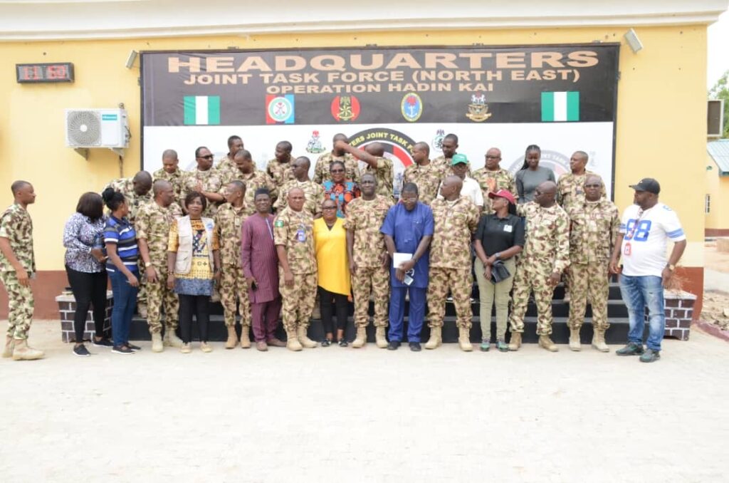 Journalist with top senior officers of Operation Hadin Kai with Commander Major General Shaibu in middle front roll seven from R -L.