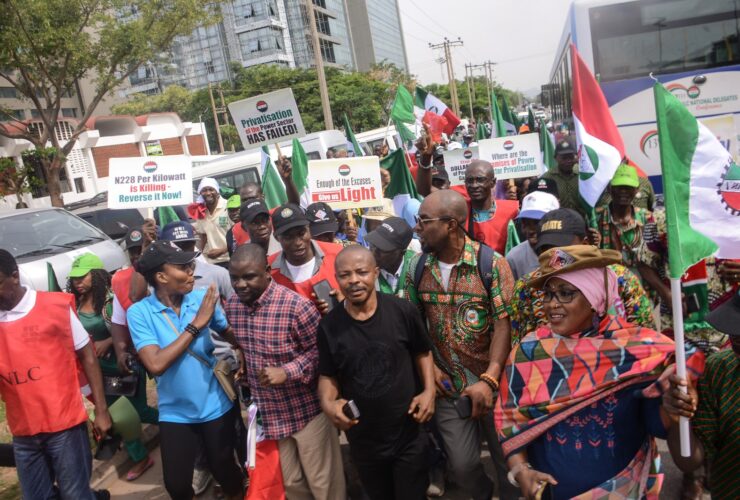Members of the Nigerian Labour Congress and the Trade Union Congress blocked the entrance of the headquarters of the Nigerian Electricity Distribution Company over the Band A tariff hike in Abuja on Monday. Photo: Olukayode jaiyeola.