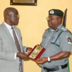 Customs Controller, Oyo/Osun Area Command, Joseph Adelaja, and the DSS State Director, Mr. Rasheed Adelakun, at the DSS state headquarters in Ibadan, Oyo State.