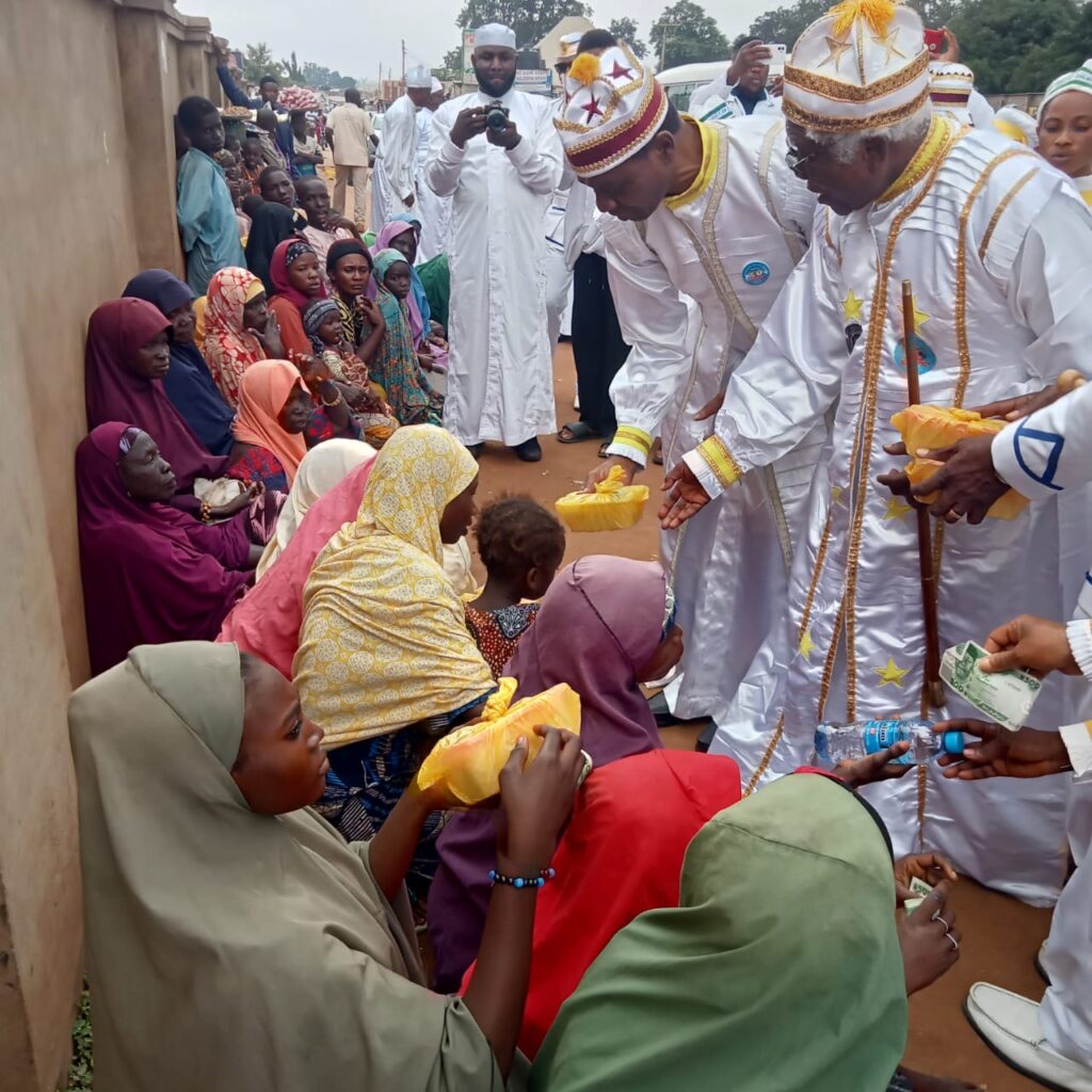 His Most Eminence, Baba - Aladura , Elder (Dr.) David Dabaye Lamjose Bob-Manuel and His Eminence, Deputy Baba -Aladura, Elder (Dr) Isaac Bello sharing food and other items to less privileges in Kamaragiji a suburb near Abuja.